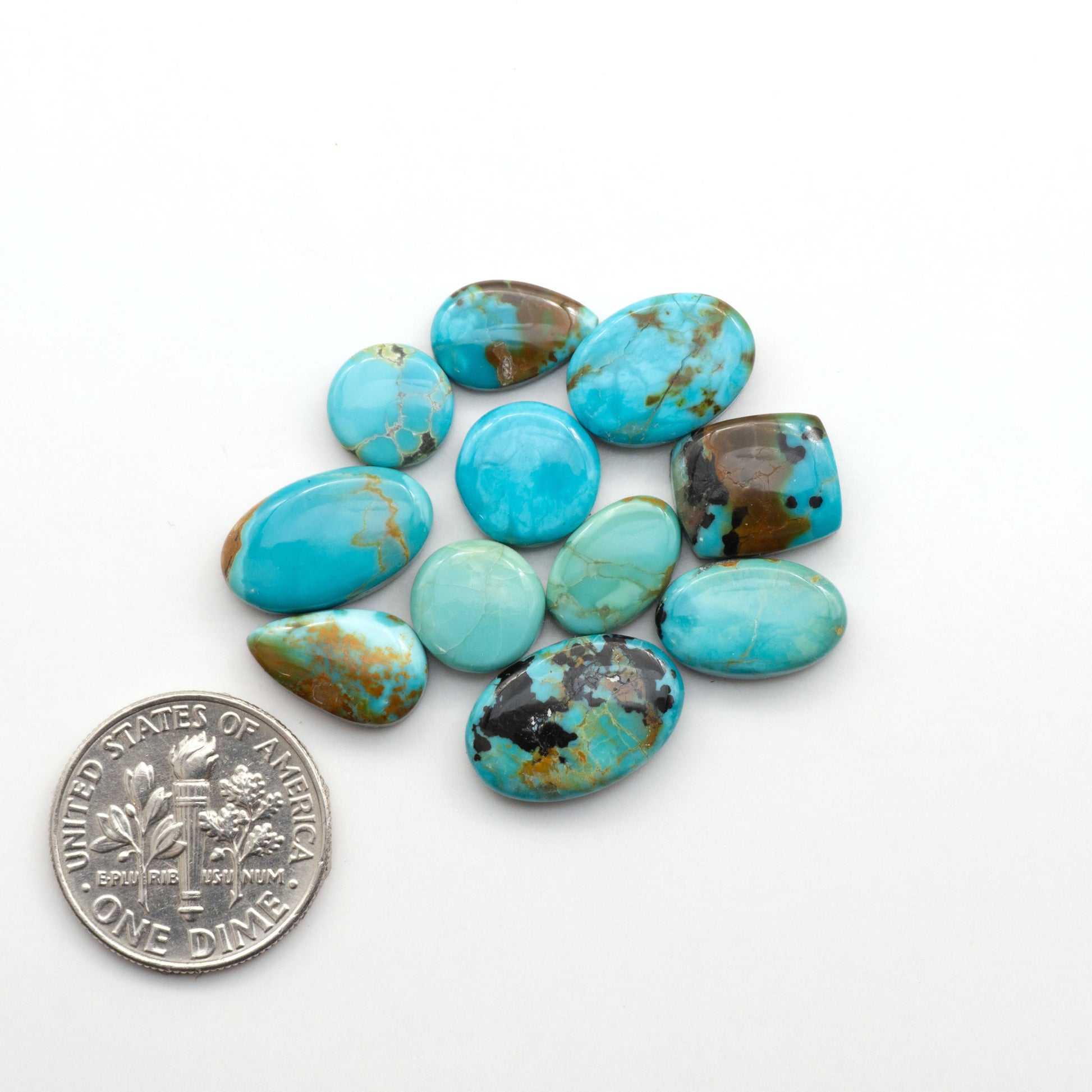 Add a touch of beauty to your collection with our stunning Pilot Mountain Turquoise Cabochons. Perfect for jewelry making each piece is truly one-of-a-kind.
