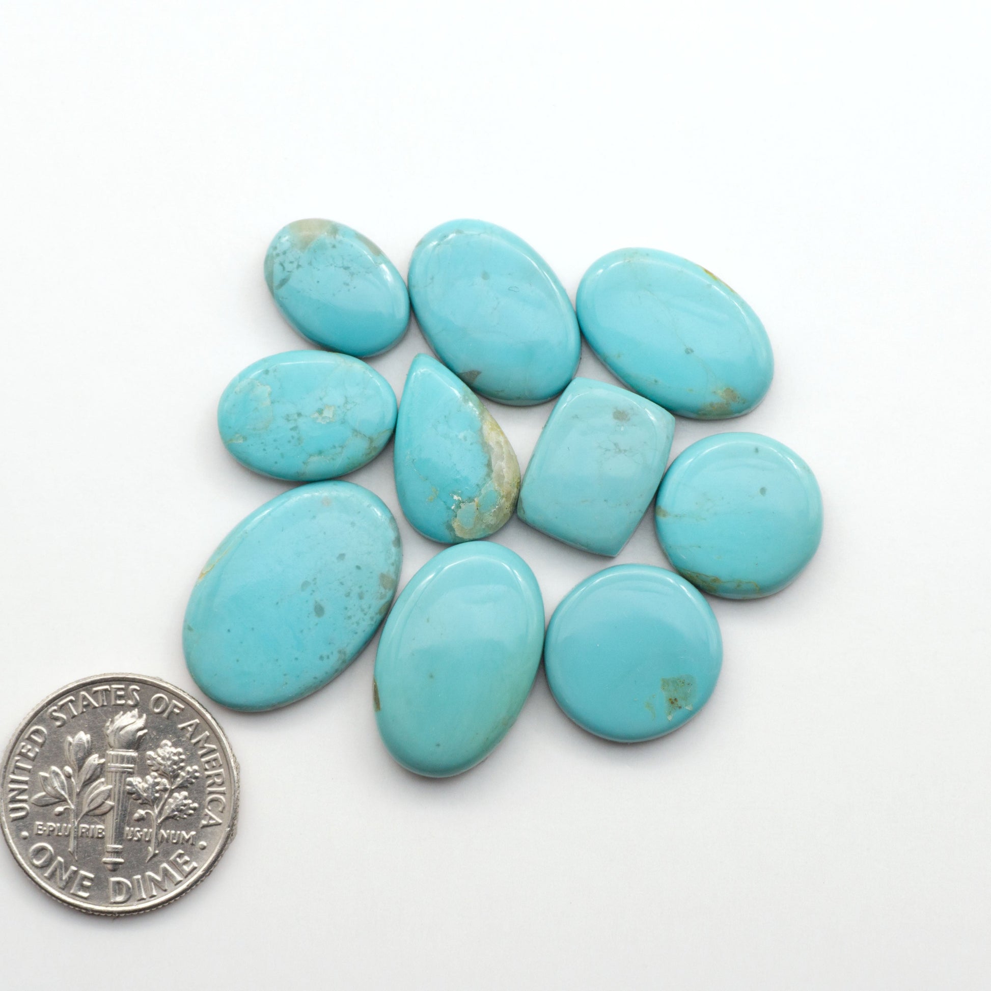 Add a touch of beauty to your collection with our stunning Pilot Mountain Turquoise Cabochons. Perfect for jewelry making each piece is truly one-of-a-kind.
