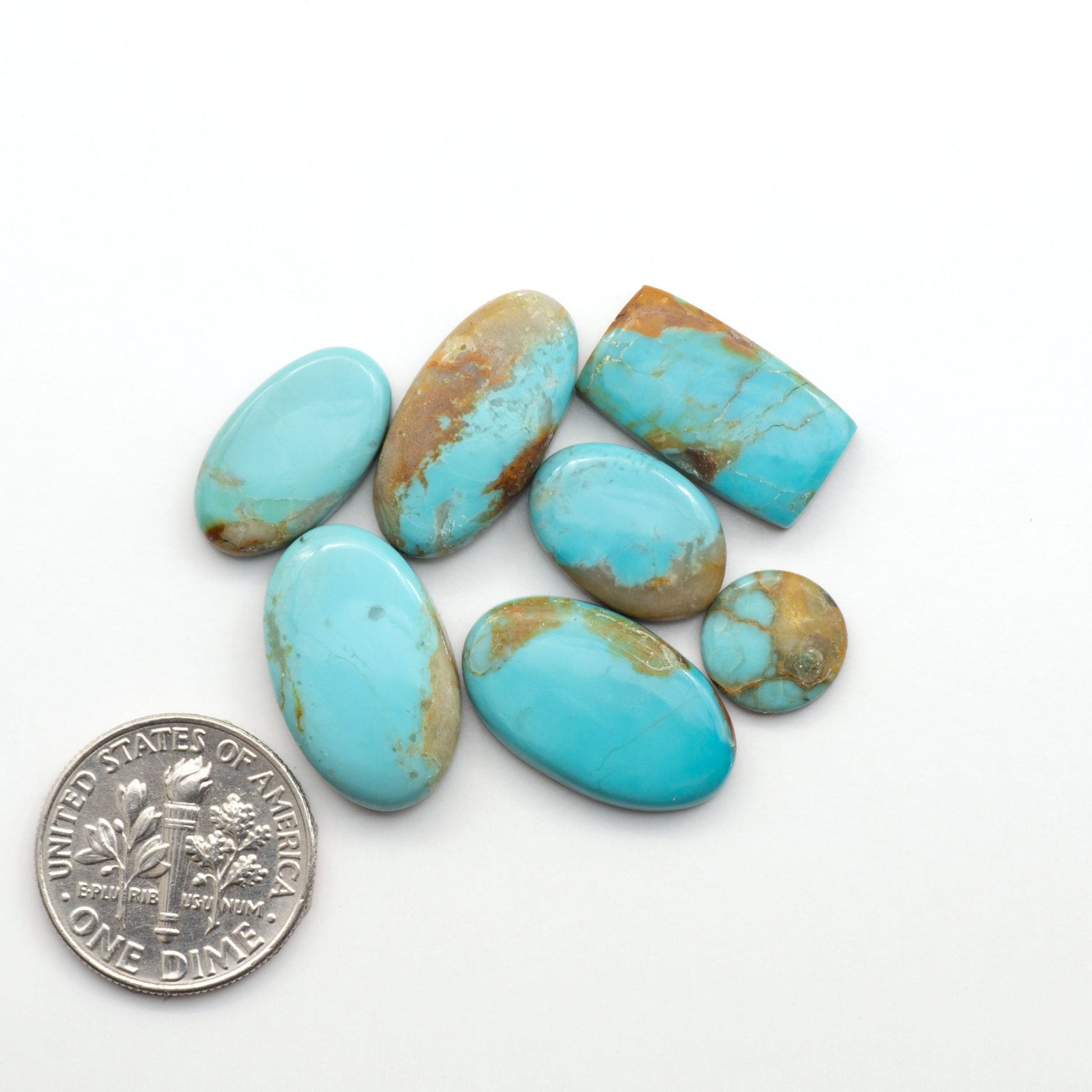 Add a touch of beauty to your collection with our stunning Pilot Mountain Turquoise Cabochons. Perfect for jewelry making each piece is truly one-of-a-kind.