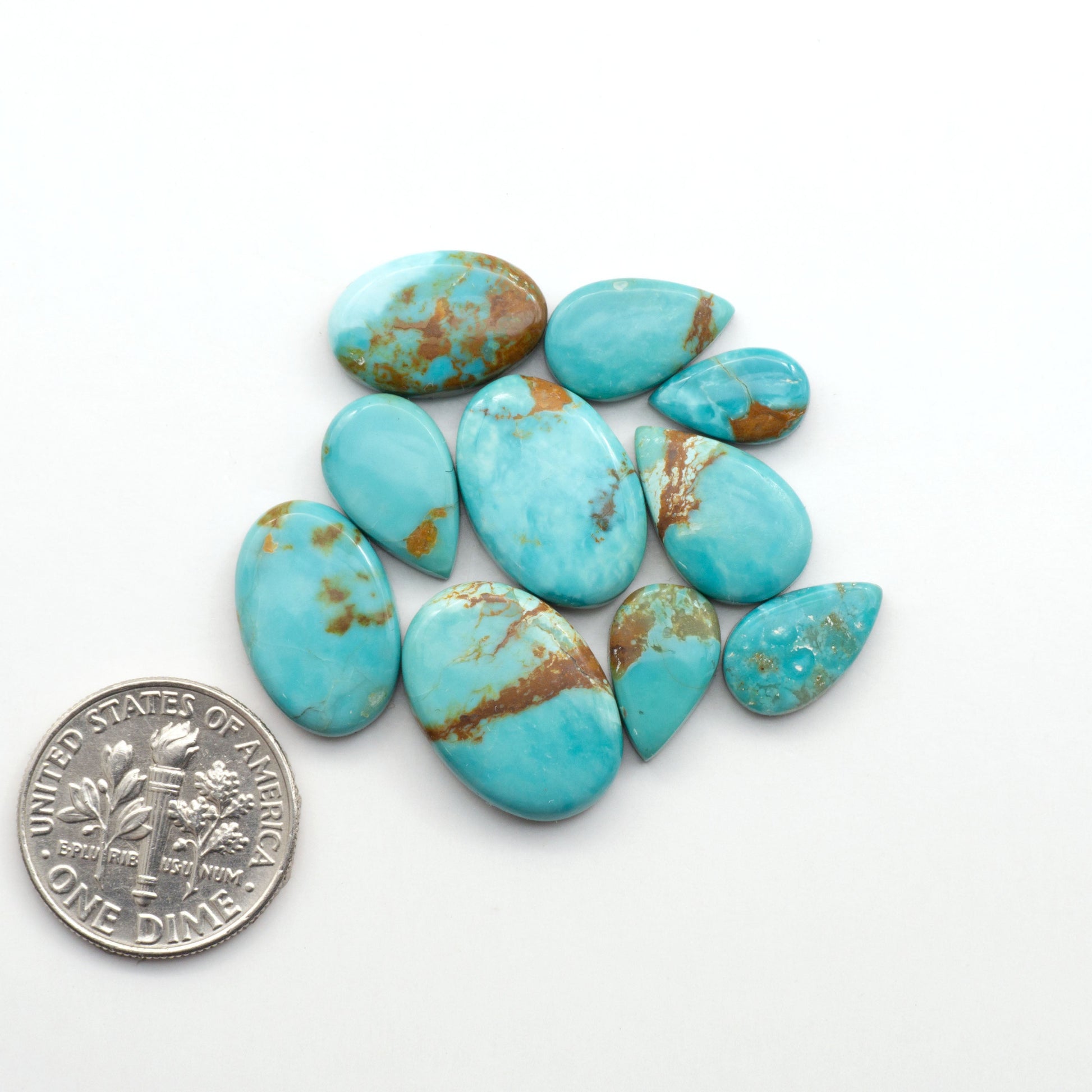 Add a touch of beauty to your collection with our stunning Pilot Mountain Turquoise Cabochons. Perfect for jewelry making each piece is truly one-of-a-kind.