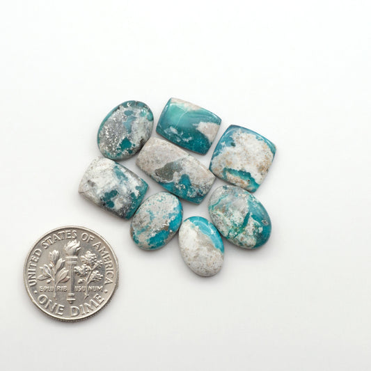 White Water Turquoise Cabochons with their mesmerizing patterns and one-of-a-kind colors, are perfect for those looking for a unique and eye-catching piece.