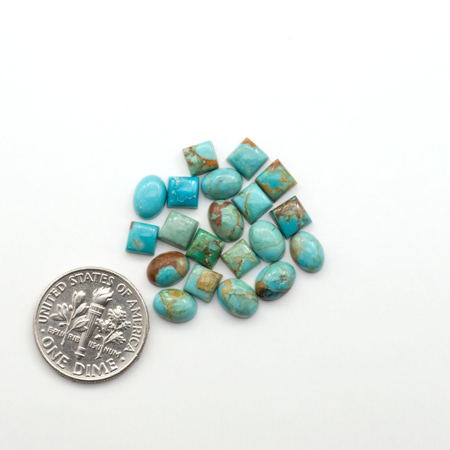 Enhance your jewelry designs with Pressed Turquoise Nugget Cabochons. Crafted from composite materials they add a captivating touch to your creations.