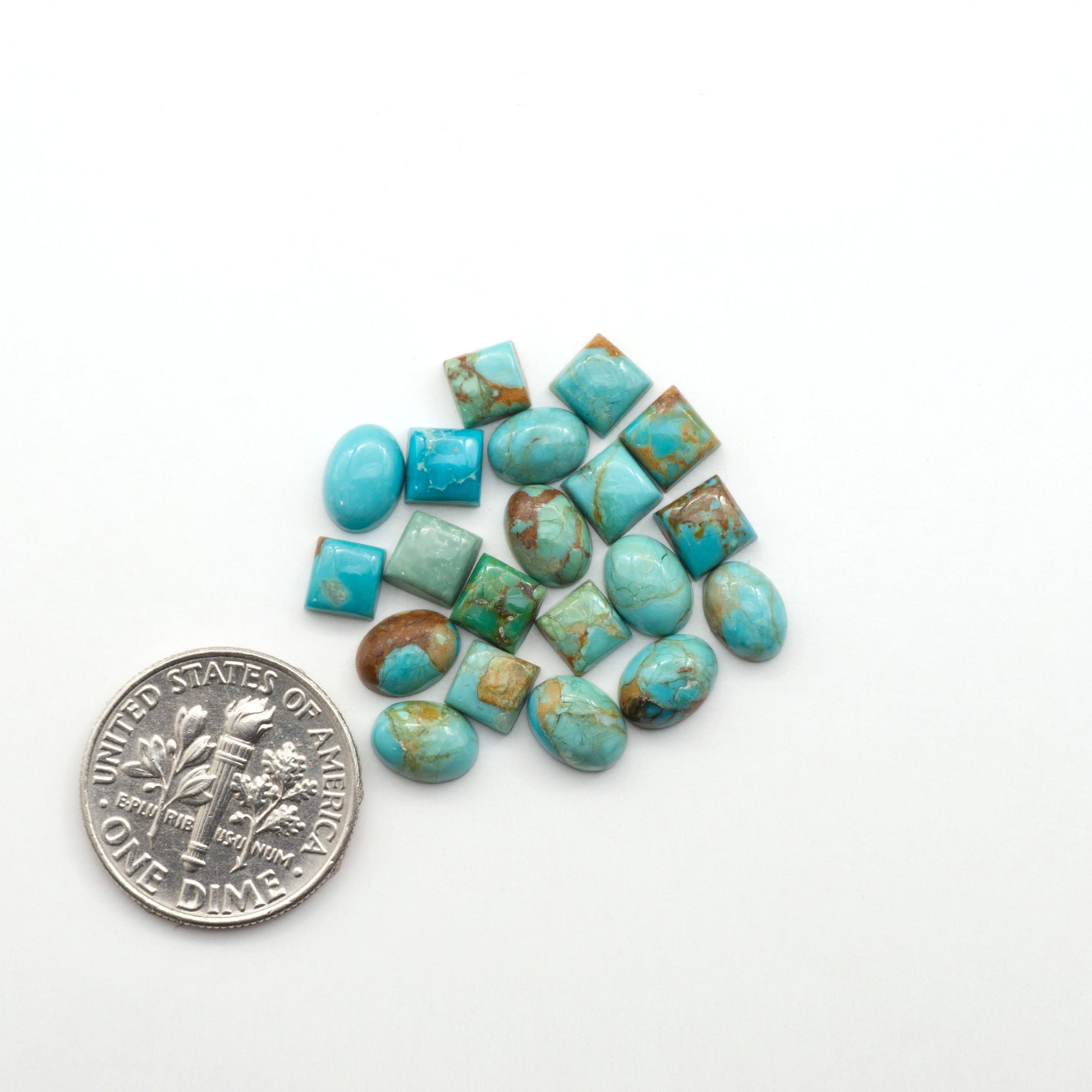 Enhance your jewelry designs with Pressed Turquoise Nugget Cabochons. Crafted from composite materials they add a captivating touch to your creations.