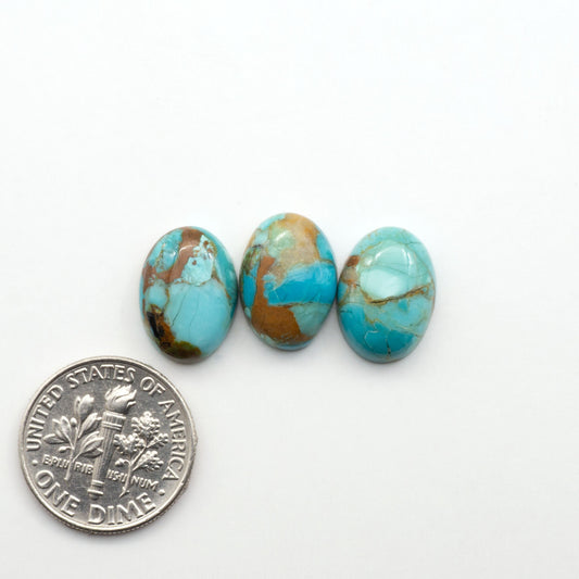 Enhance your jewelry designs with Pressed Turquoise Nugget Cabochons. Crafted from composite materials they add a captivating touch to your creations.