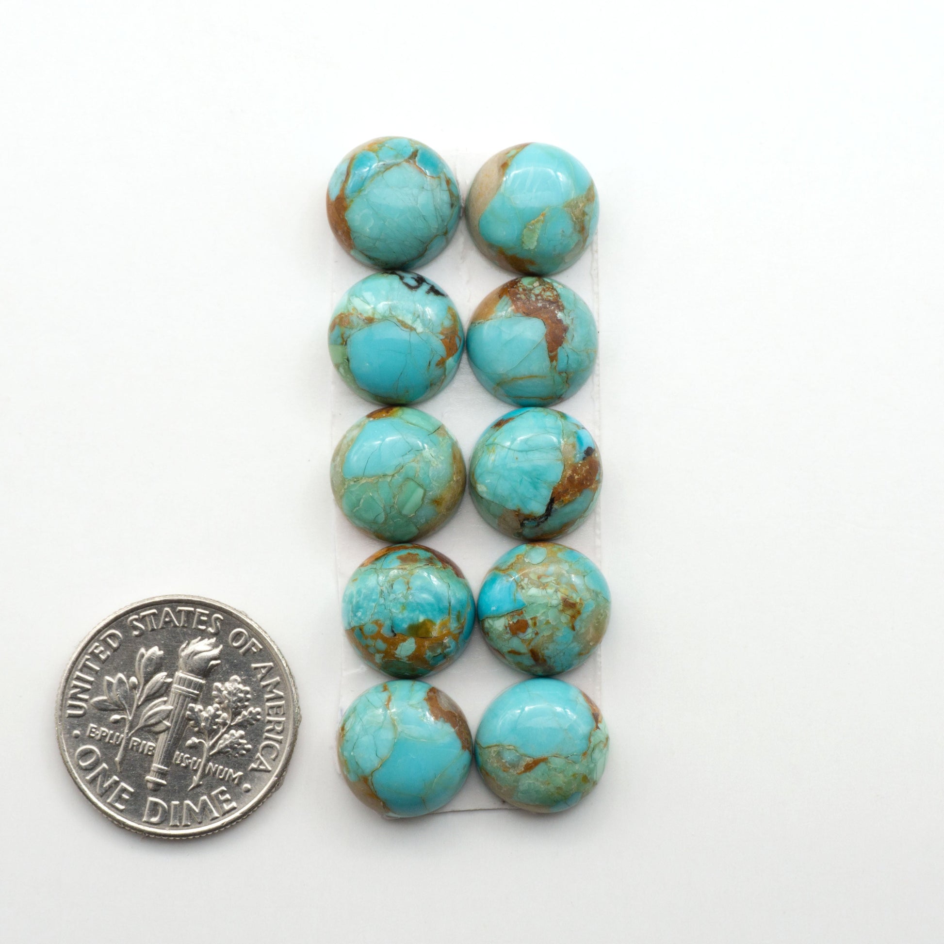 Enhance your jewelry designs with Pressed Turquoise Nugget Cabochons. Crafted from composite materials they add a captivating touch to your creations.