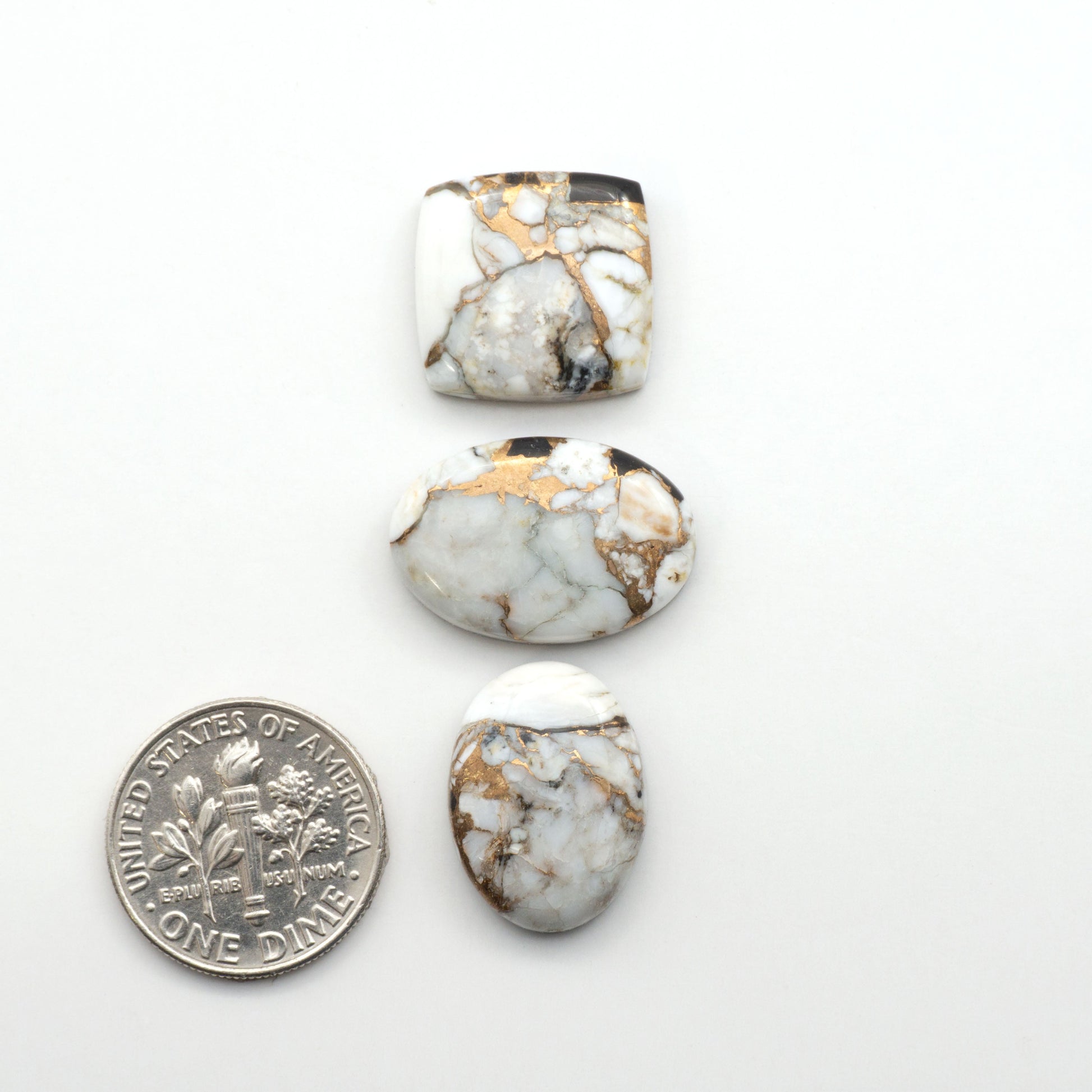 Elevate your jewelry pieces with these stunning White Buffalo Cabochons. With their unique and intricate patterns, they add a touch of elegance to any design.