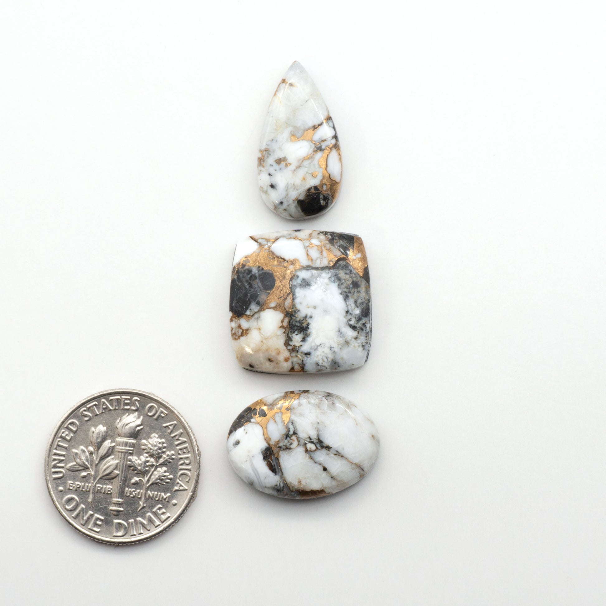 Elevate your jewelry pieces with these stunning White Buffalo Cabochons. With their unique and intricate patterns, they add a touch of elegance to any design.