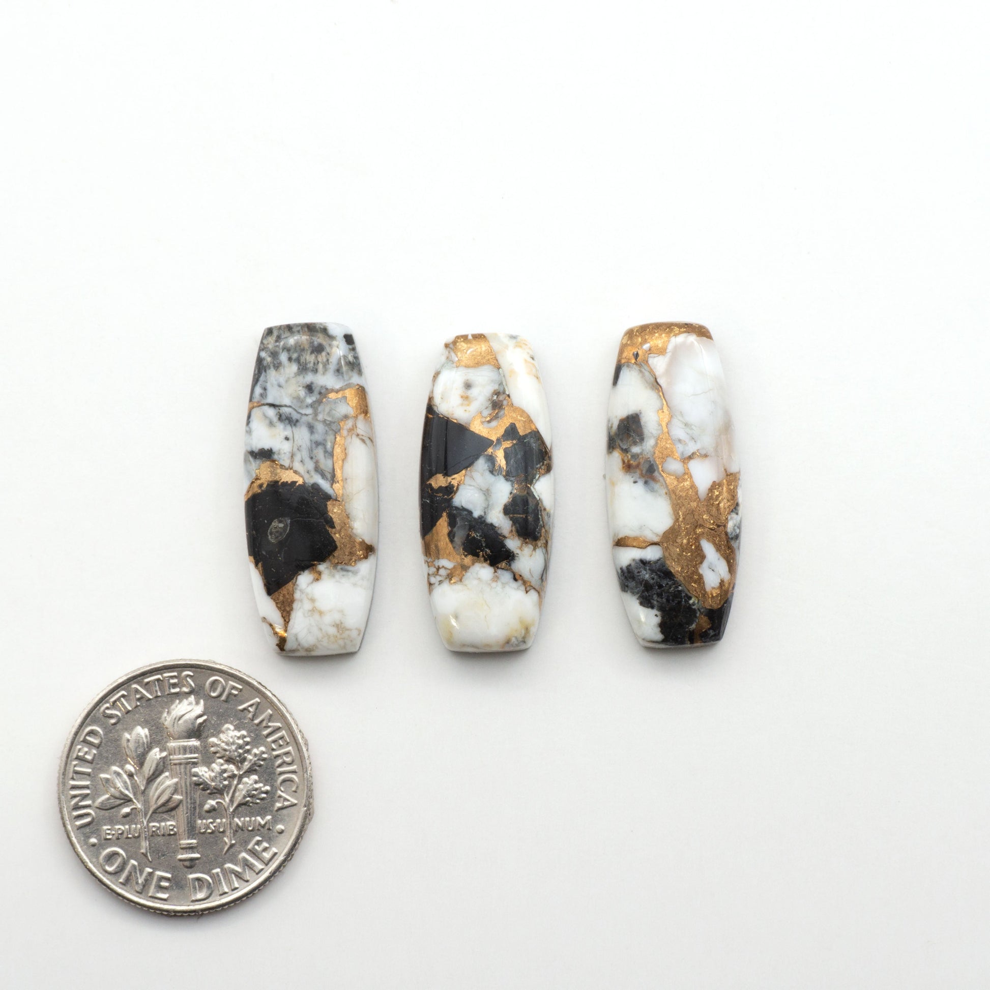 Elevate your jewelry pieces with these stunning White Buffalo Cabochons. With their unique and intricate patterns, they add a touch of elegance to any design.