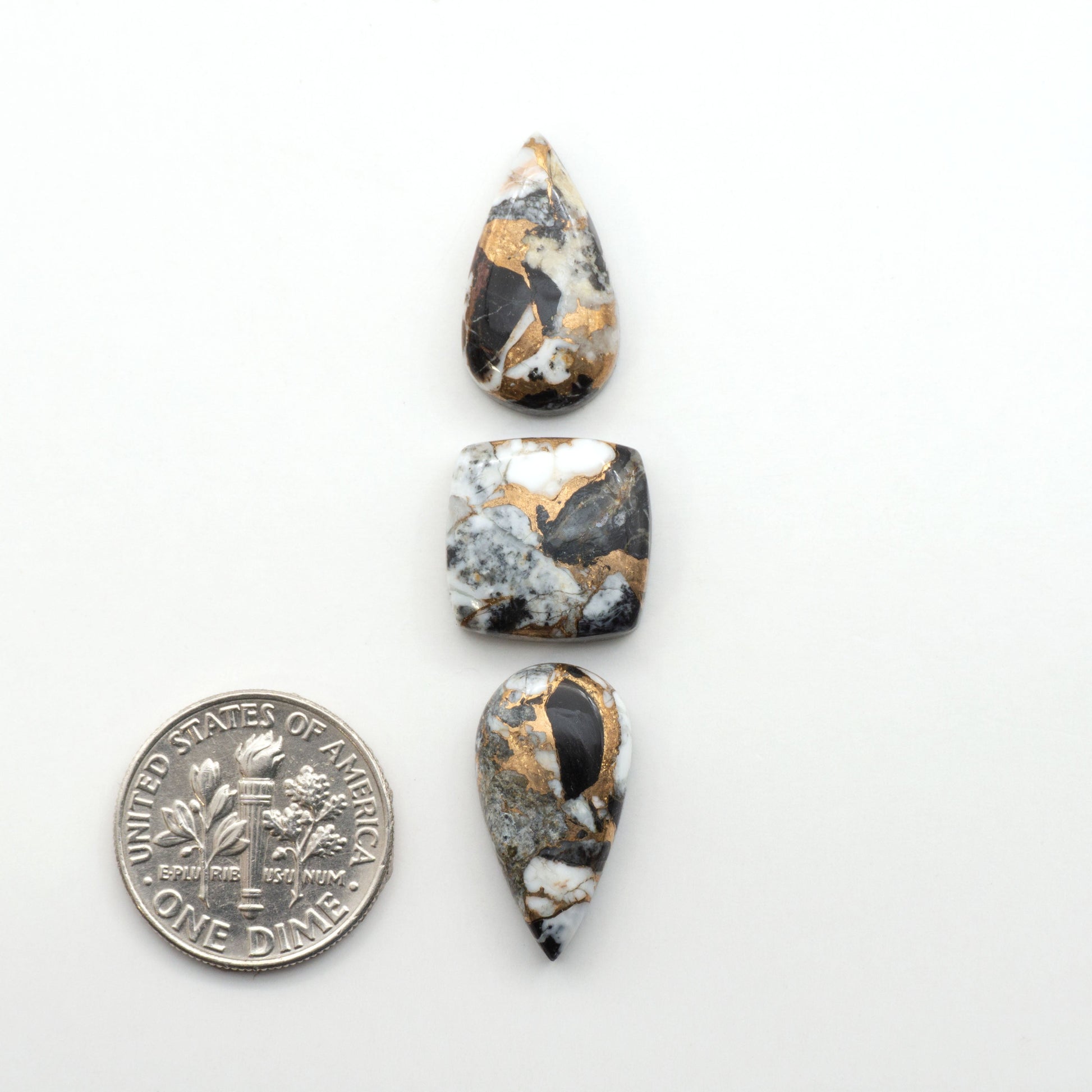 Elevate your jewelry pieces with these stunning White Buffalo Cabochons. With their unique and intricate patterns, they add a touch of elegance to any design.