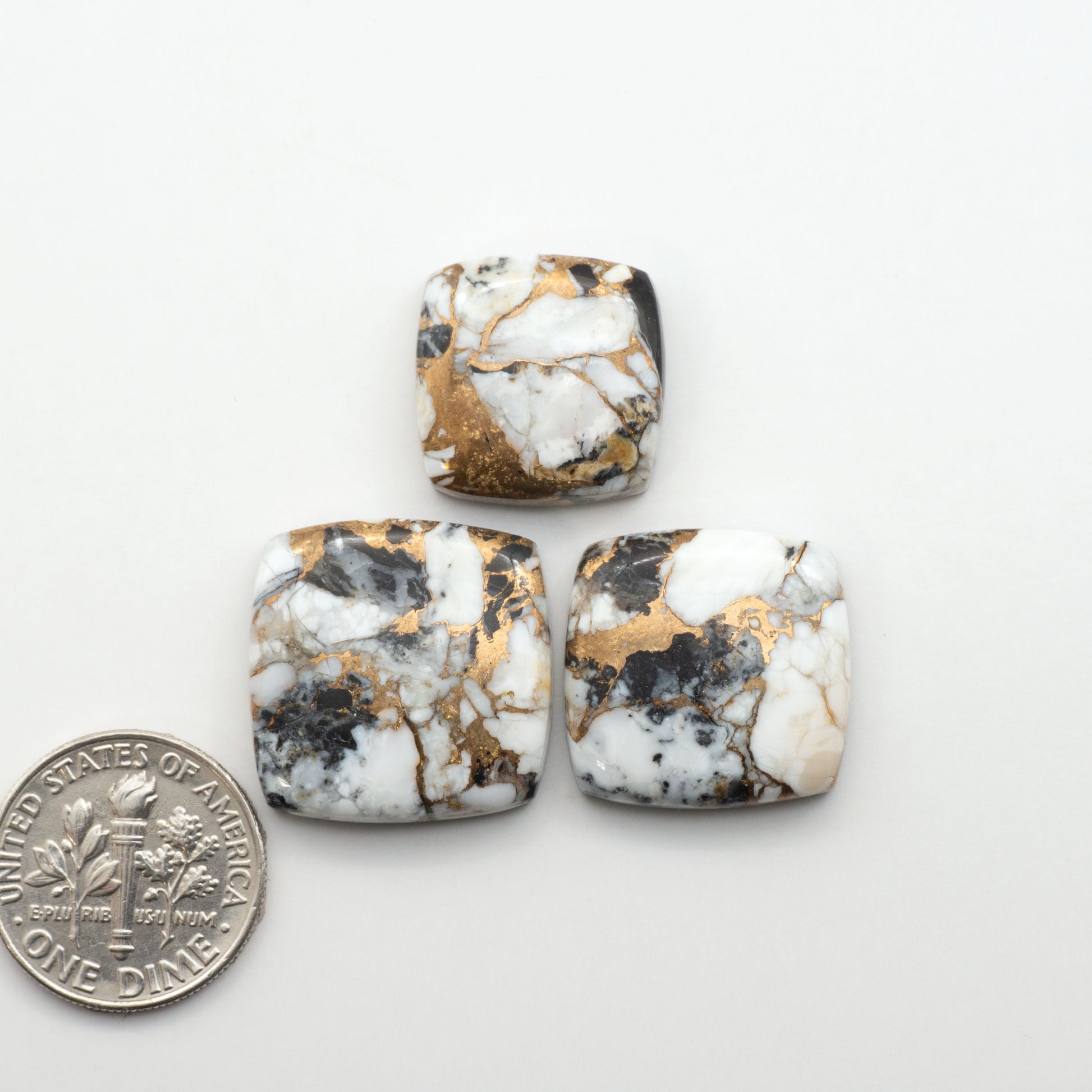 Elevate your jewelry pieces with these stunning White Buffalo Cabochons. With their unique and intricate patterns, they add a touch of elegance to any design.