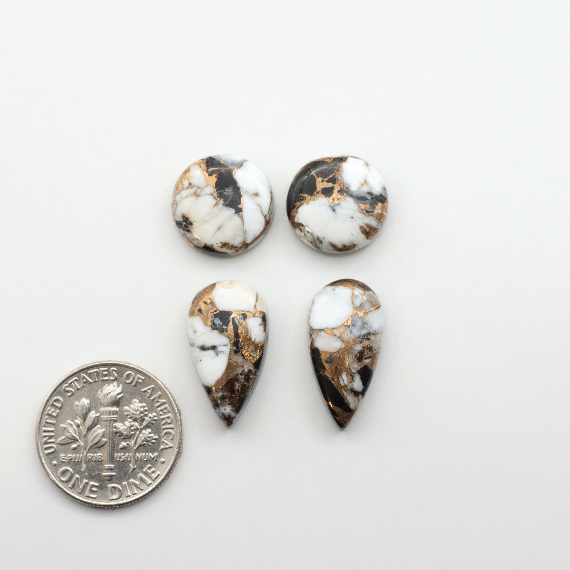 Elevate your jewelry pieces with these stunning White Buffalo Cabochons. With their unique and intricate patterns, they add a touch of elegance to any design.