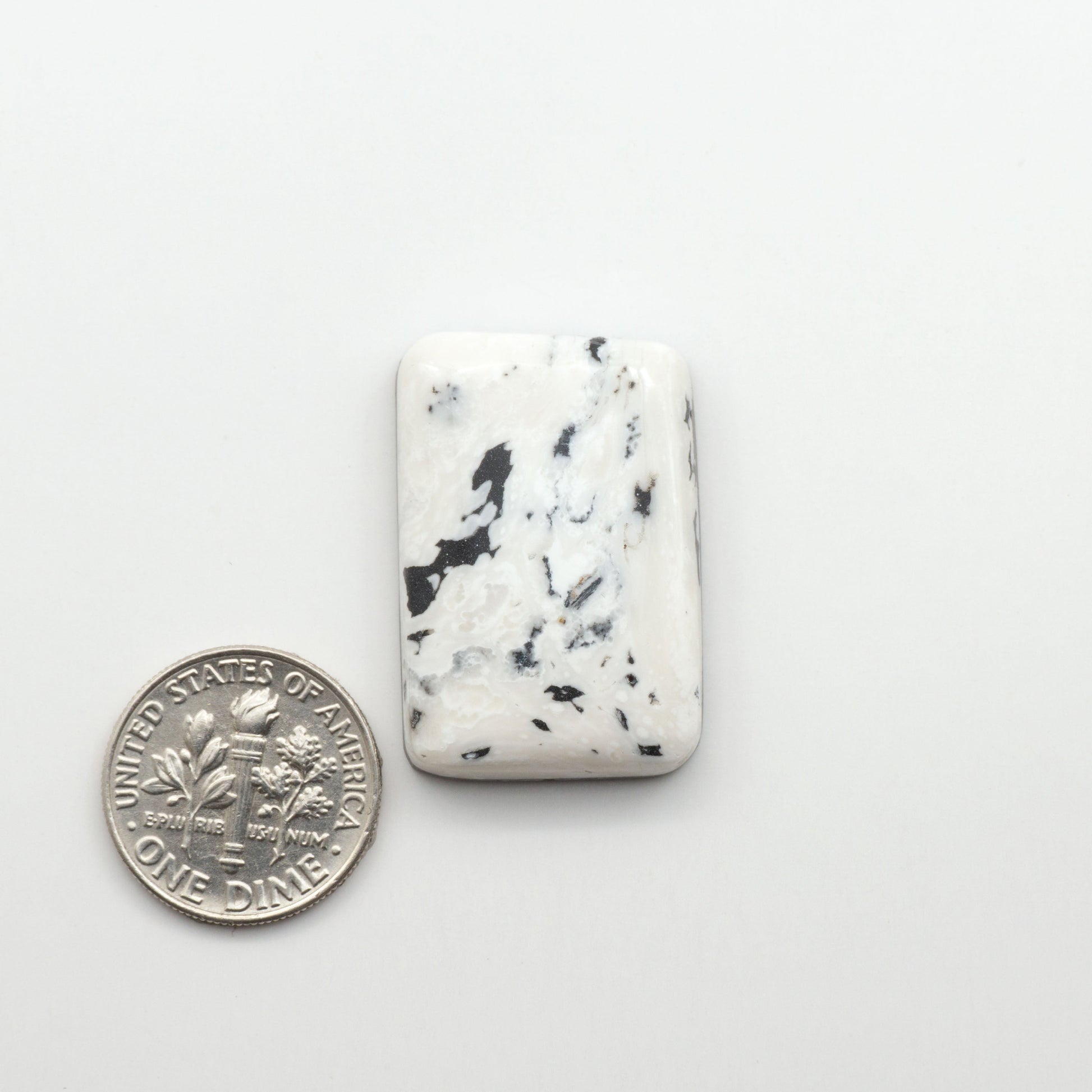 Natural White Buffalo Stone Cabochons are semi-precious gemstones cut into shapes ideal for jewelry-making, making them an excellent choice for artisans.