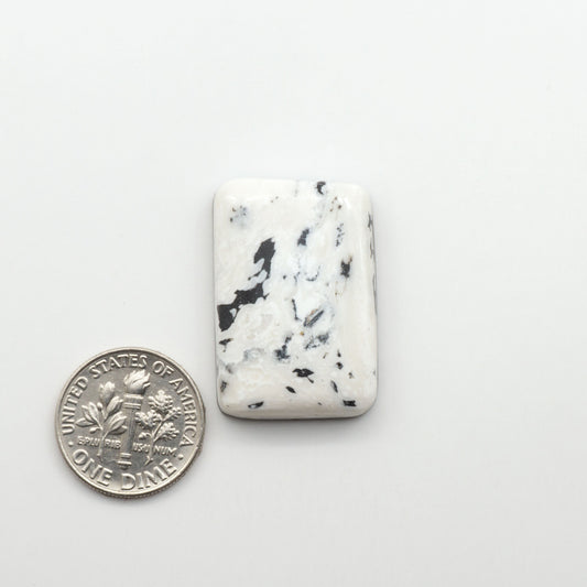 Natural White Buffalo Stone Cabochons are semi-precious gemstones cut into shapes ideal for jewelry-making, making them an excellent choice for artisans.