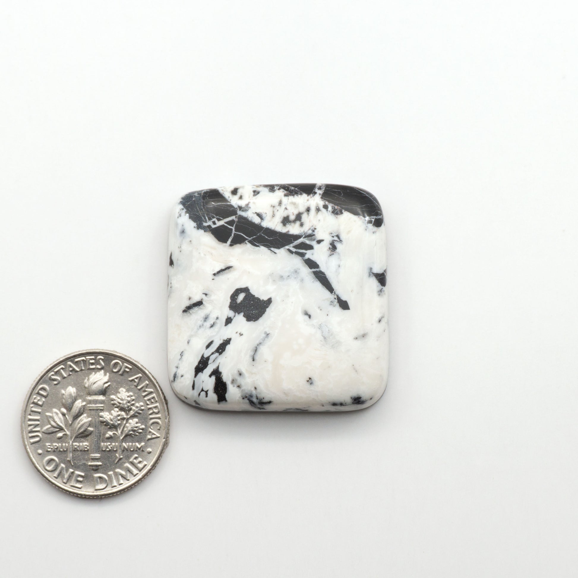 Natural White Buffalo Stone Cabochons are semi-precious gemstones cut into shapes ideal for jewelry-making, making them an excellent choice for artisans.