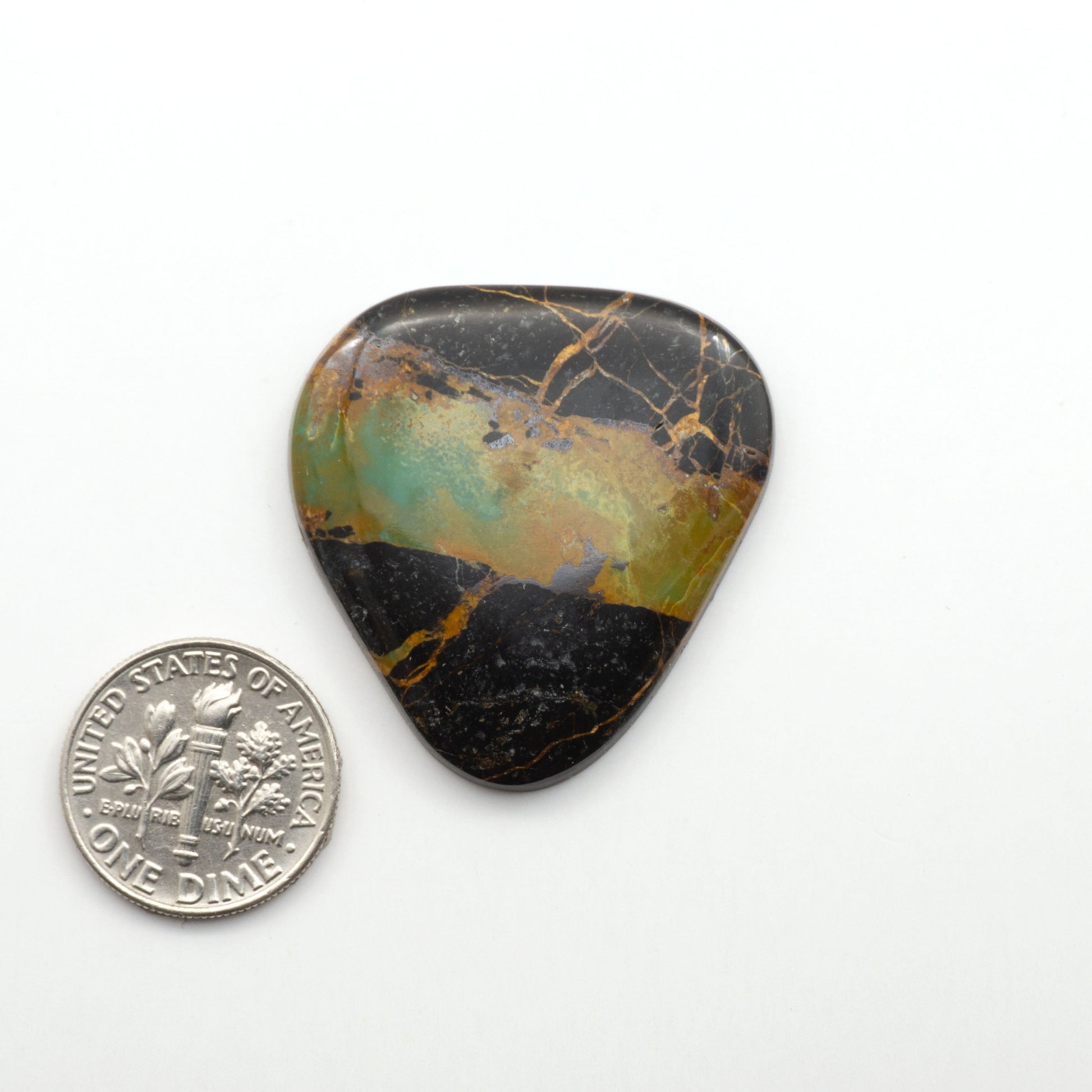 Black Jack Turquoise features a bold black color with striking veins of turquoise, making it a truly one-of-a-kind addition to your jewelry collection. 
