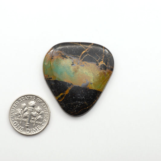 Black Jack Turquoise features a bold black color with striking veins of turquoise, making it a truly one-of-a-kind addition to your jewelry collection. 