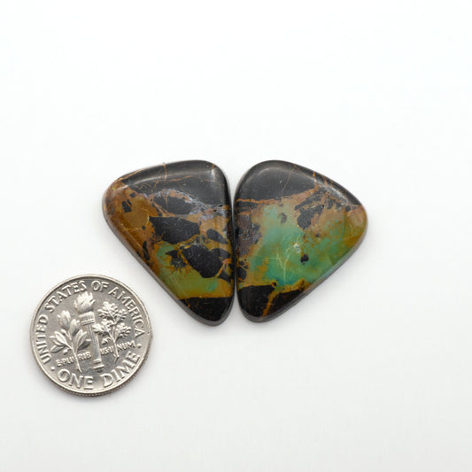 Black Jack Turquoise features a bold black color with striking veins of turquoise, making it a truly one-of-a-kind addition to your jewelry collection. 