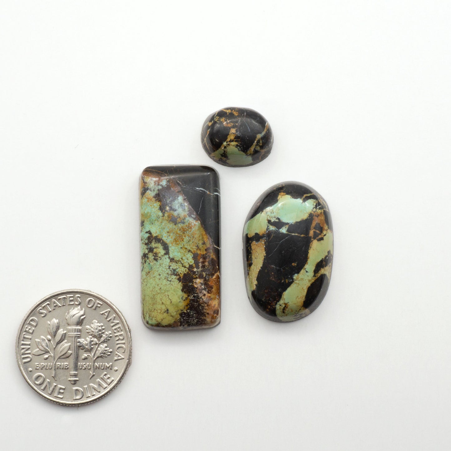Black Jack Turquoise features a bold black color with striking veins of turquoise, making it a truly one-of-a-kind addition to your jewelry collection.

