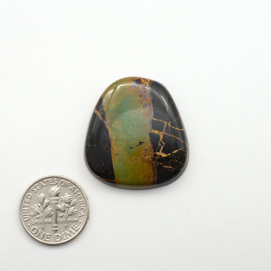 Black Jack Turquoise features a bold black color with striking veins of turquoise, making it a truly one-of-a-kind addition to your jewelry collection.

