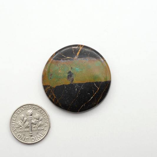 Black Jack Turquoise features a bold black color with striking veins of turquoise, making it a truly one-of-a-kind addition to your jewelry collection.

