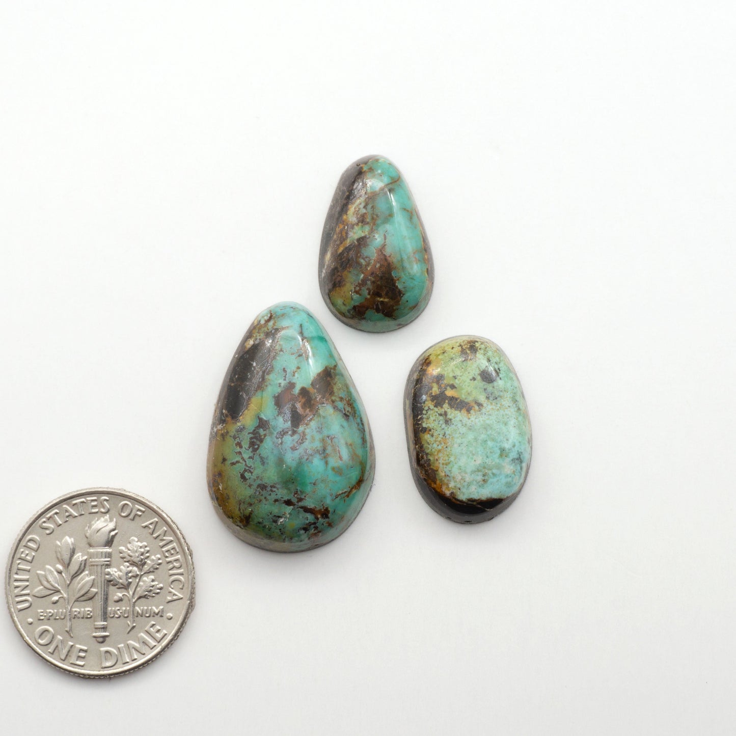 Black Jack Turquoise features a bold black color with striking veins of turquoise, making it a truly one-of-a-kind addition to your jewelry collection.


