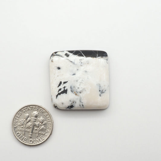 Natural White Buffalo Stone Cabochons are semi-precious gemstones cut into shapes ideal for jewelry-making, making them an excellent choice for artisans.
