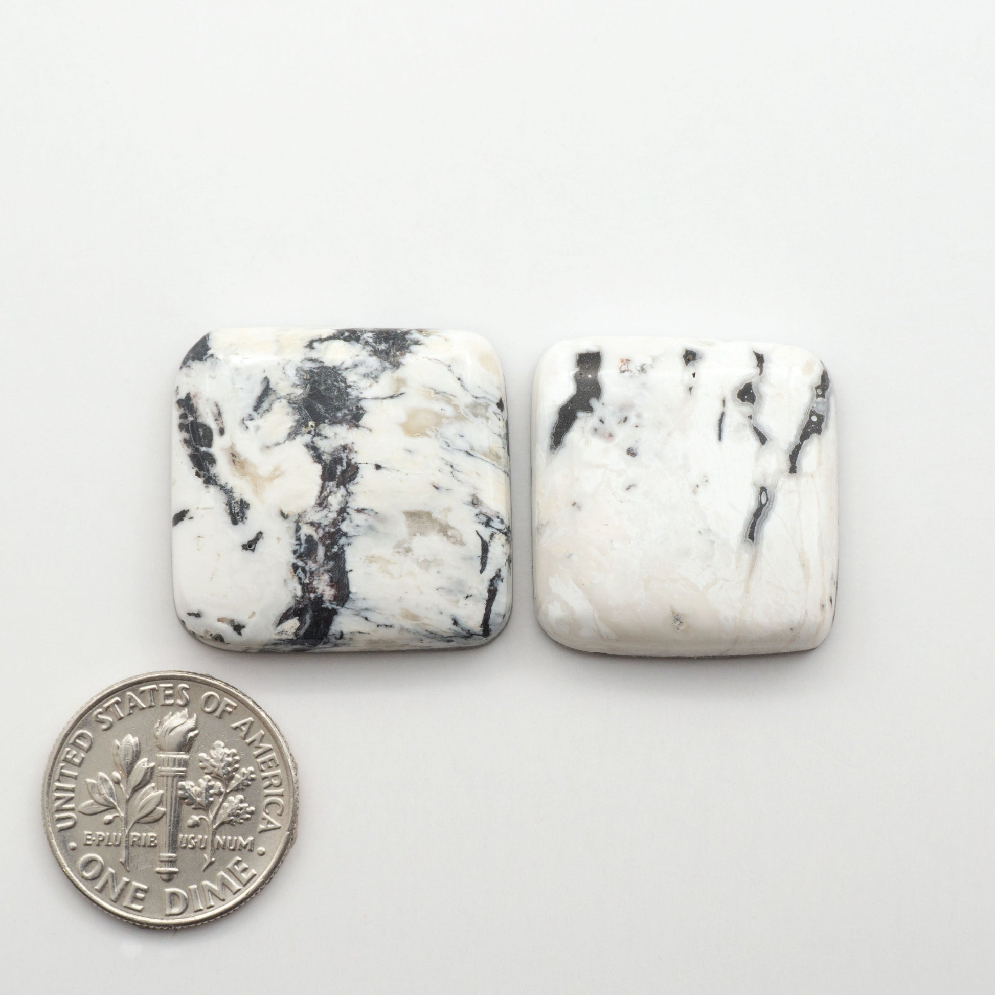 Natural White Buffalo Stone Cabochons are semi-precious gemstones cut into shapes ideal for jewelry-making, making them an excellent choice for artisans.