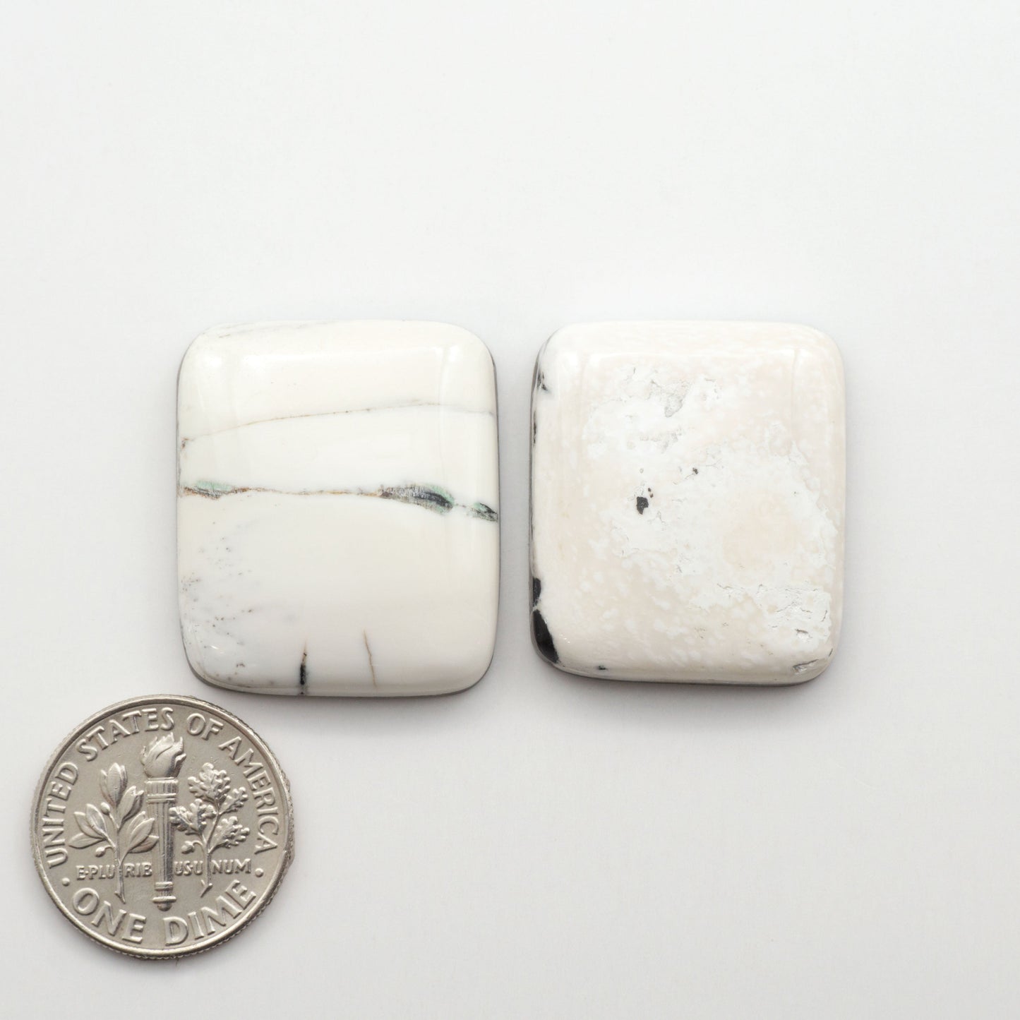 Natural White Buffalo Stone Cabochons are semi-precious gemstones cut into shapes ideal for jewelry-making, making them an excellent choice for artisans.