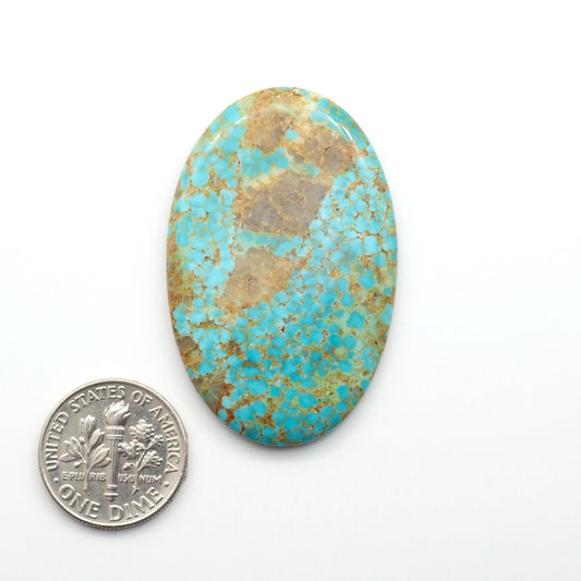 Kingman Turquoise Cabochons are a staple in the jewelry industry, known for their stunning blue-green color. Perfect for necklaces, earrings, and more!