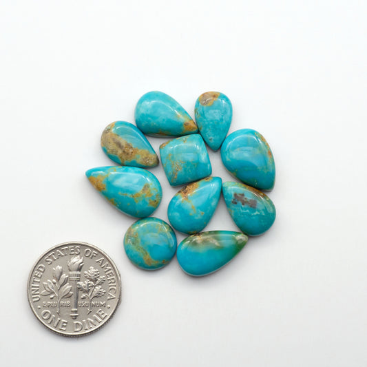 Kingman Turquoise Cabochons are a staple in the jewelry industry, known for their stunning blue-green color. Perfect for necklaces, earrings, and more!
