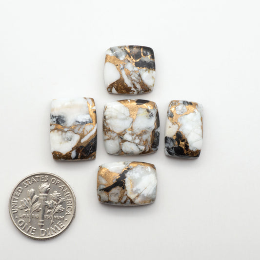 Elevate your jewelry pieces with these stunning White Buffalo Cabochons. With their unique and intricate patterns, they add a touch of elegance to any design.