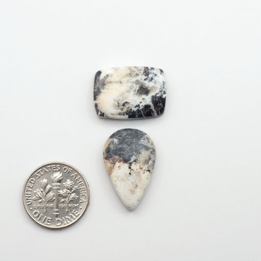 Natural White Buffalo Stone Cabochons are semi-precious gemstones cut into shapes ideal for jewelry-making, making them an excellent choice for artisans.