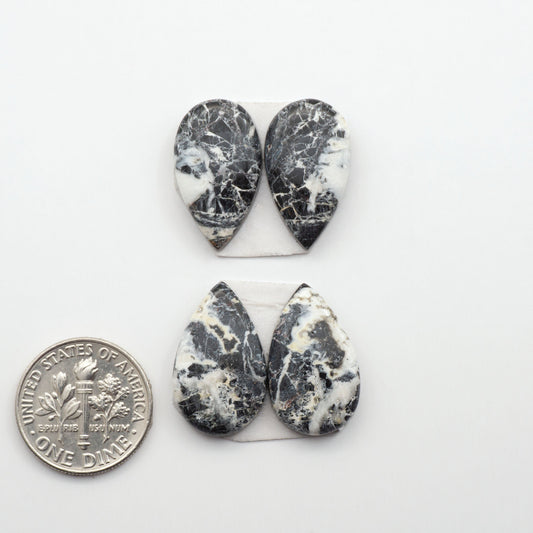 Natural White Buffalo Stone Cabochons are semi-precious gemstones cut into shapes ideal for jewelry-making, making them an excellent choice for artisans.