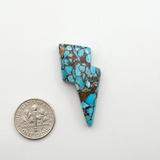 Enhance your jewelry designs with Pressed Turquoise Nugget Cabochons. Crafted from composite materials they add a captivating touch to your creations.