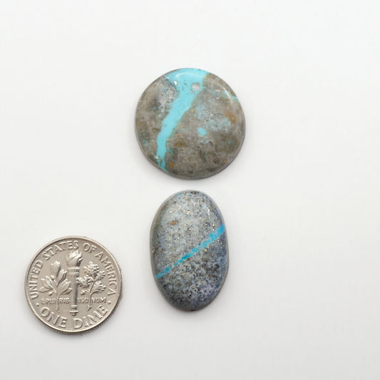 Nacozari turquoise cabochons are striking gemstones known for their vibrant blue to greenish-blue colors and pyrite, these stones are prized in jewelry making.