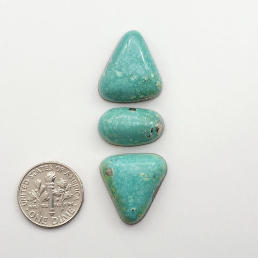 Nacozari turquoise cabochons are striking gemstones known for their vibrant blue to greenish-blue colors and pyrite, these stones are prized in jewelry making.