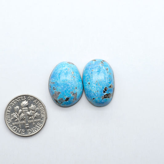 Nacozari turquoise cabochons are striking gemstones known for their vibrant blue to greenish-blue colors and pyrite, these stones are prized in jewelry making.