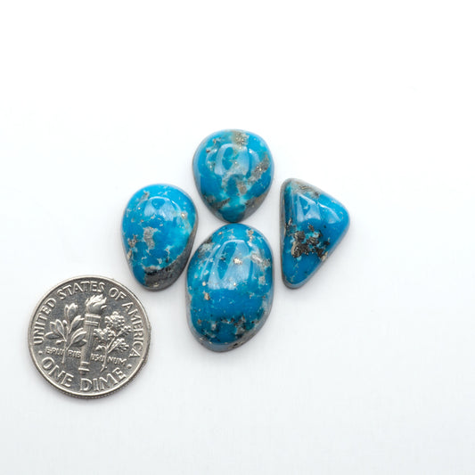 Nacozari turquoise cabochons are striking gemstones known for their vibrant blue to greenish-blue colors and pyrite, these stones are prized in jewelry making.