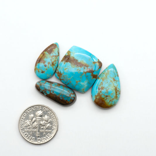 Kingman Turquoise Cabochons are a staple in the jewelry industry, known for their stunning blue-green color. Perfect for necklaces, earrings, and more!