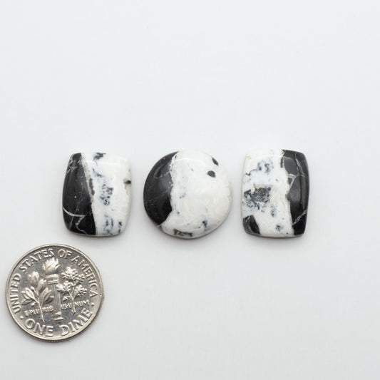 Natural White Buffalo Stone Cabochons are semi-precious gemstones cut into shapes ideal for jewelry-making, making them an excellent choice for artisans.