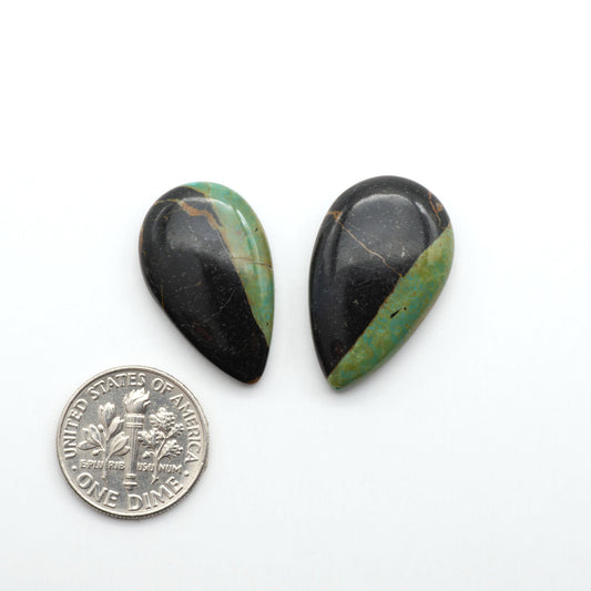 Black Jack Turquoise features a bold black color with striking veins of turquoise, making it a truly one-of-a-kind addition to your jewelry collection.