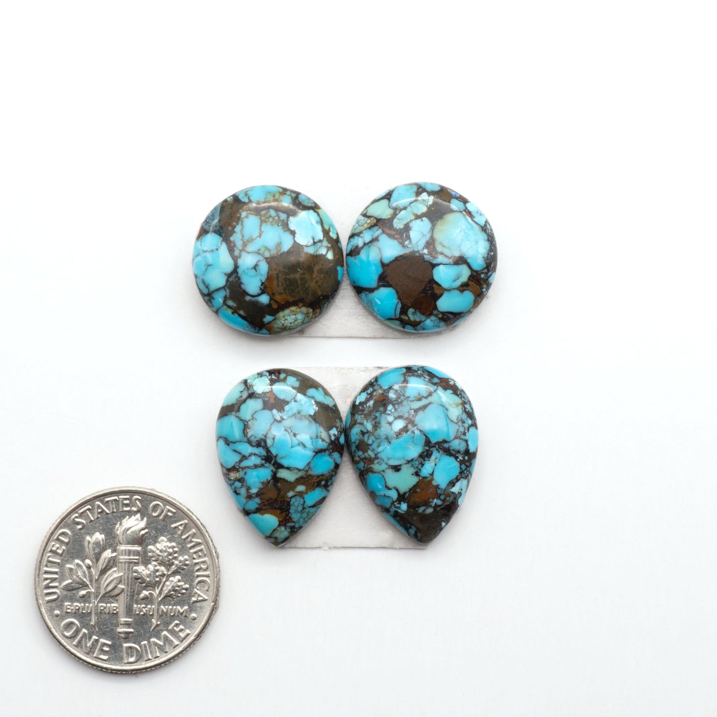 Enhance your jewelry designs with Pressed Turquoise Nugget Cabochons. Crafted from composite materials they add a captivating touch to your creations.