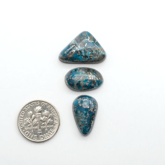 Nacozari turquoise cabochons are striking gemstones known for their vibrant blue to greenish-blue colors and pyrite, these stones are prized in jewelry making.