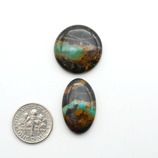 Black Jack Turquoise features a bold black color with striking veins of turquoise, making it a truly one-of-a-kind addition to your jewelry collection.