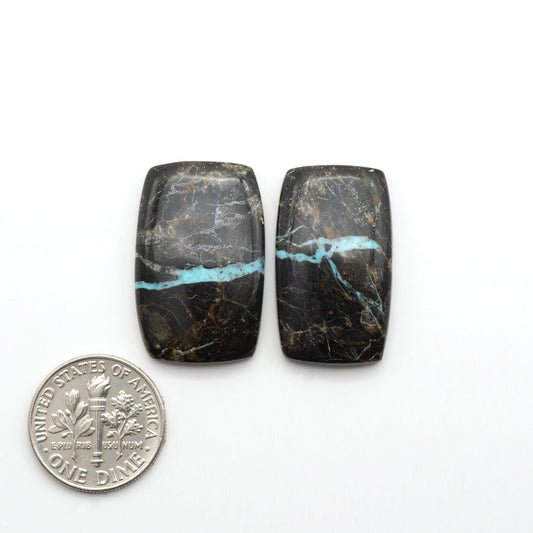Black Jack Turquoise features a bold black color with striking veins of turquoise, making it a truly one-of-a-kind addition to your jewelry collection.