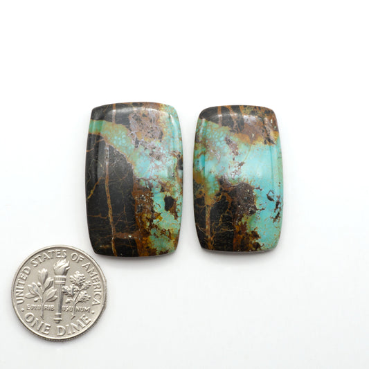 Black Jack Turquoise features a bold black color with striking veins of turquoise, making it a truly one-of-a-kind addition to your jewelry collection.