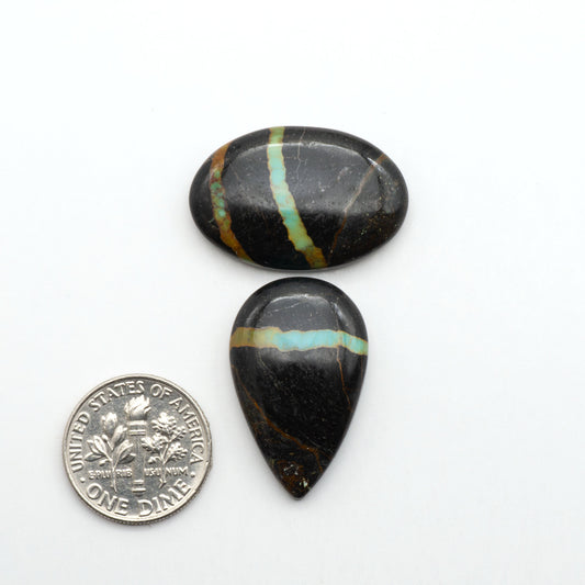 Natural White Buffalo Stone Cabochons are semi-precious gemstones cut into shapes ideal for jewelry-making, making them an excellent choice for artisans.