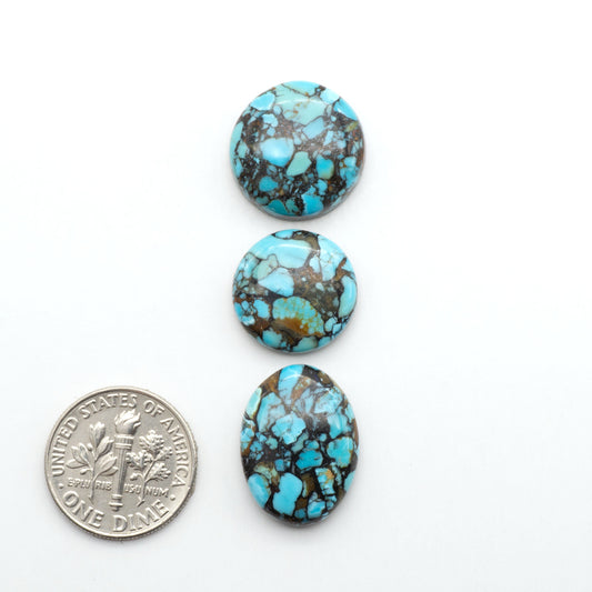 Enhance your jewelry designs with Pressed Turquoise Nugget Cabochons. Crafted from composite materials they add a captivating touch to your creations.