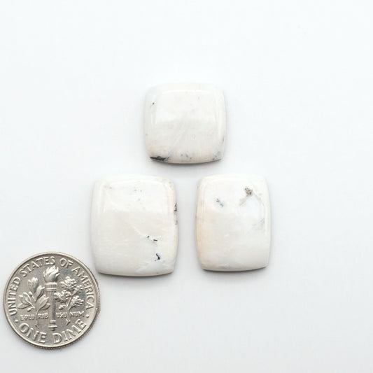 Natural White Buffalo Stone Cabochons are semi-precious gemstones cut into shapes ideal for jewelry-making, making them an excellent choice for artisans.