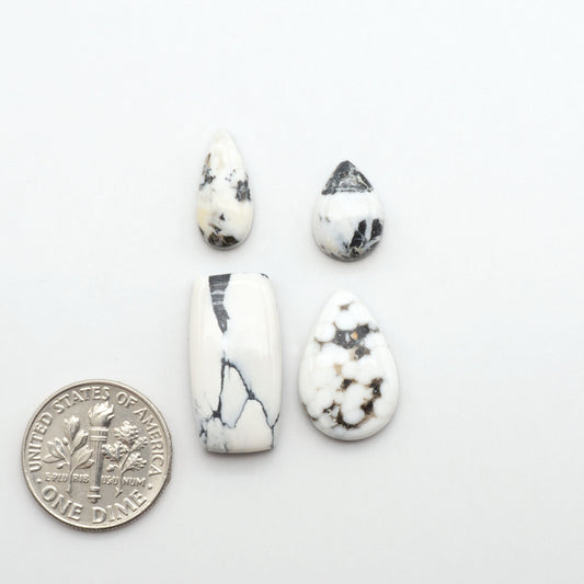 Natural White Buffalo Stone Cabochons are semi-precious gemstones cut into shapes ideal for jewelry-making, making them an excellent choice for artisans.